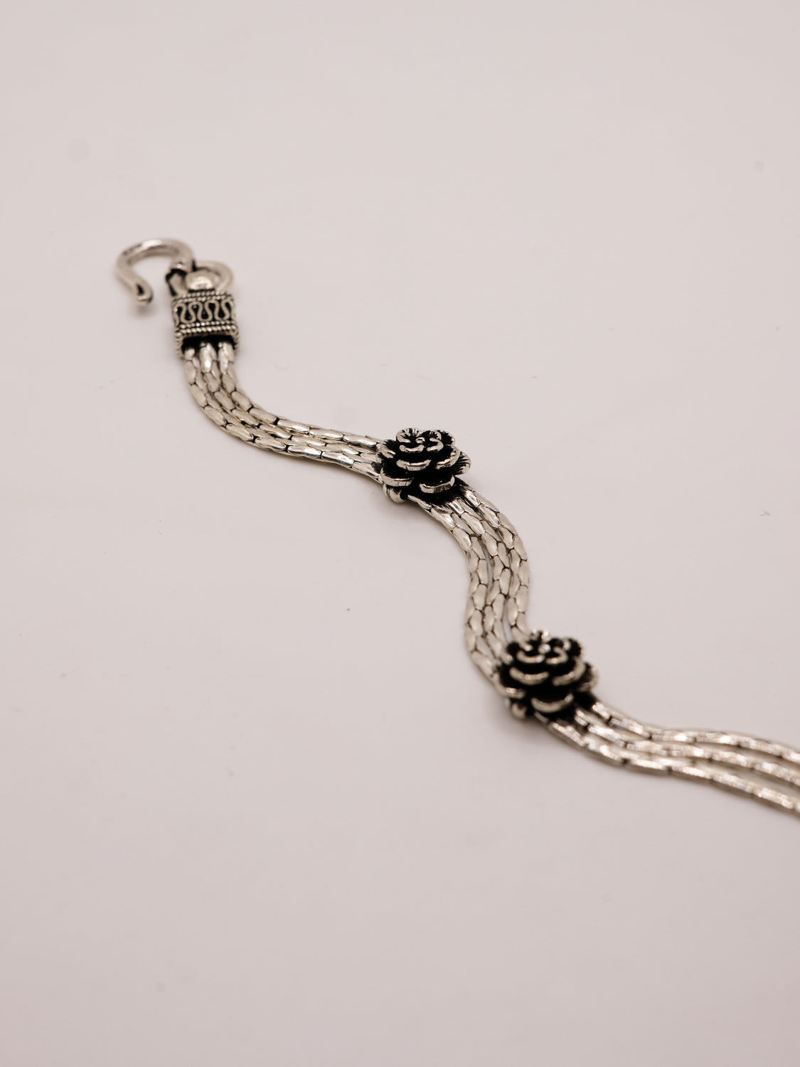 Intricate chain floral bracelet
