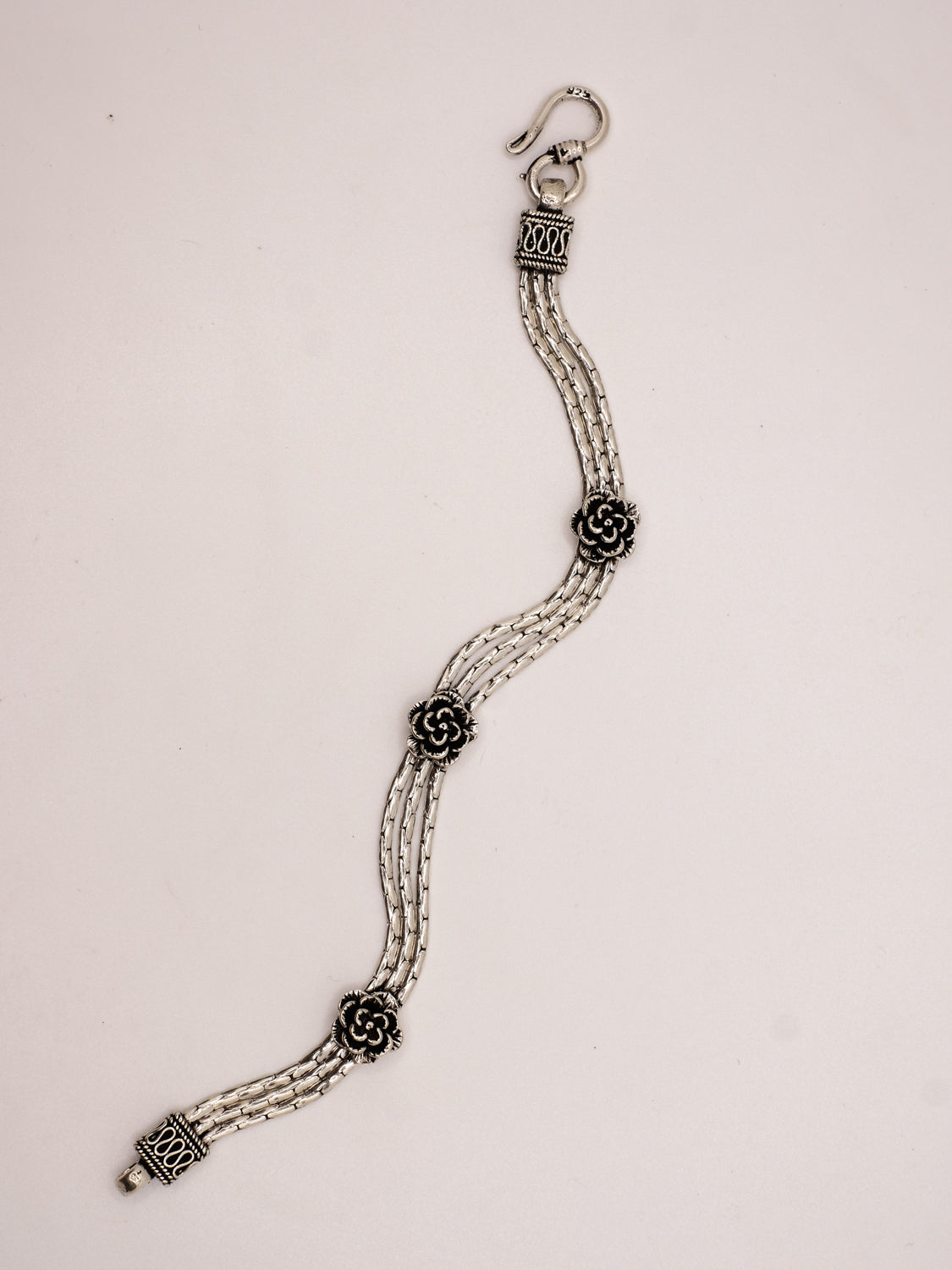 Intricate chain floral bracelet