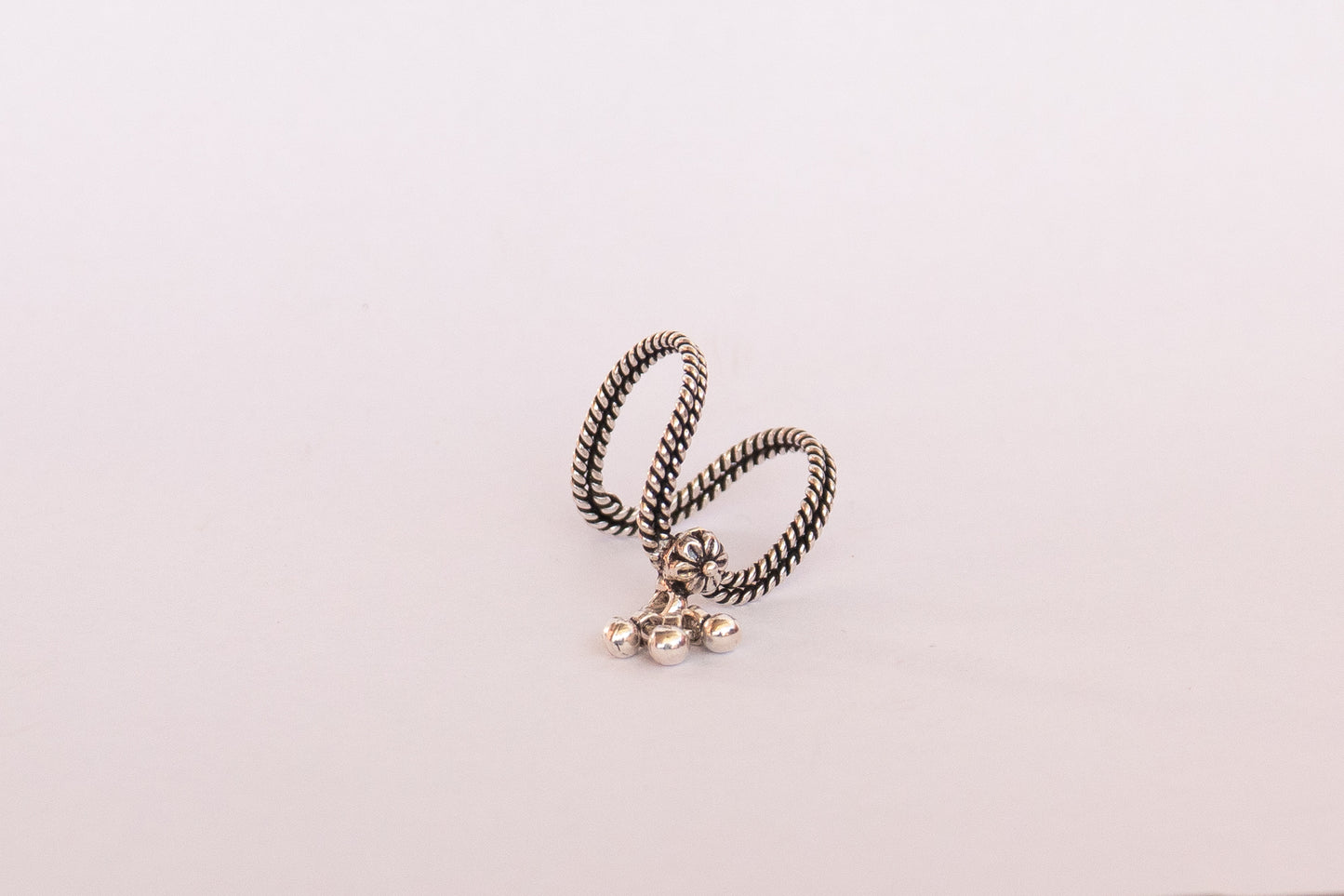 Twisted Ring With Flower Motif And Ghungroo - SAADHGEE